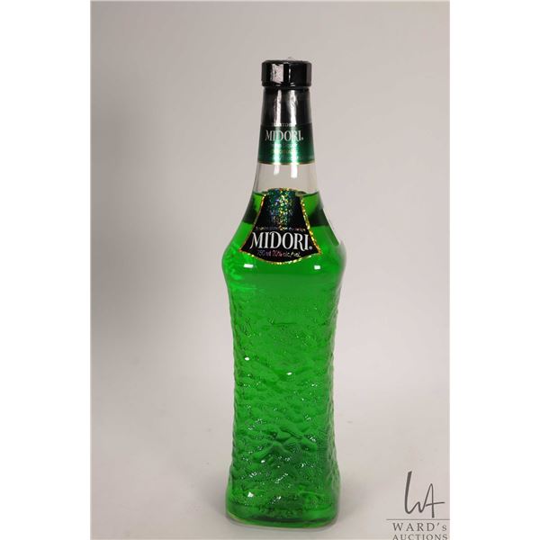 Midori/ Melon Liquor/ 750ml/ 20% ABV Note: Alcohol cannot be insured by any courier in Canada. Local
