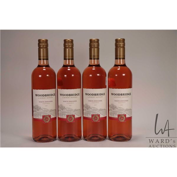 Four bottles of Woodbridge/ 2017 White Zinfandel/ 750ml/ 9% ABV Note: Alcohol cannot be insured by a