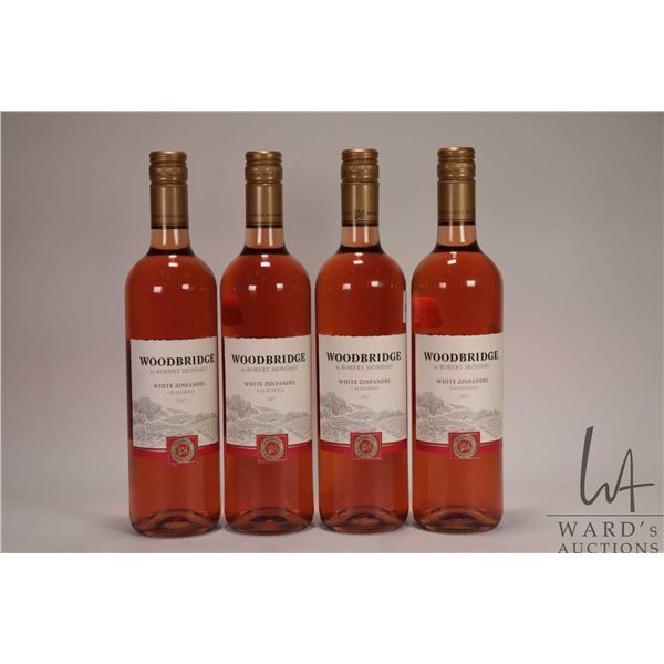 Four bottles of Woodbridge/ 2017 White Zinfandel/ 750ml/ 9% ABV Note: Alcohol cannot be insured by a