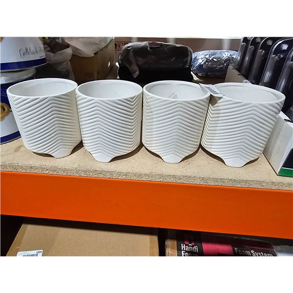 Four White Ceramic Pots With Wavy Textured Design 4″dia 5″ tall