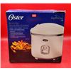 Image 1 : Oster Multi-Use Deluxe Rice Cooker