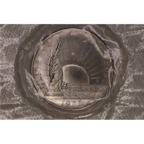 1986-D US LIBERTY UNC HALF DOLLAR IN SEALED