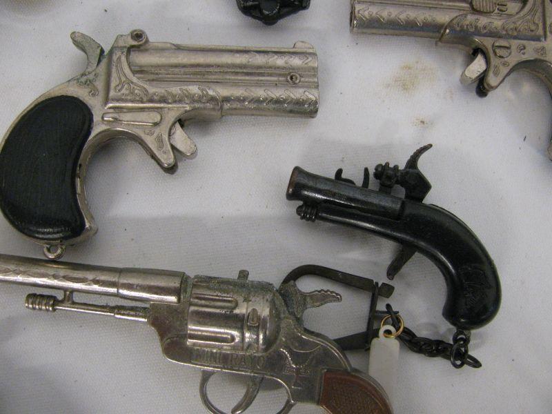 20+ Gun Toys, Lighters, Keychains, Bolo, etc.