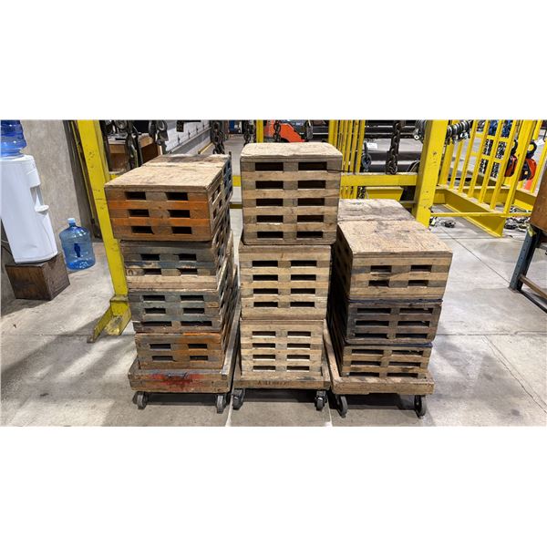 GROUP OF 3- 4 WHEEL FLAT DOLLIES LOADED WITH APPROX 20 WOOD MATERIAL SETTING BLOCKS