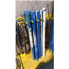 Image 3 : 2 YELLOW WALL MOUNT HANGERS WITH ASSORTED LIFTING CHAINS, AIR HOSE, CLAMPS & METAL PIECES