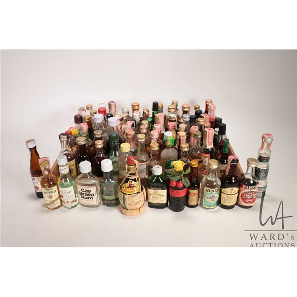 Tray lot of assorted miniature liqour bottles. Assorted sizes and ABV's. Note: Alcohol cannot be ins