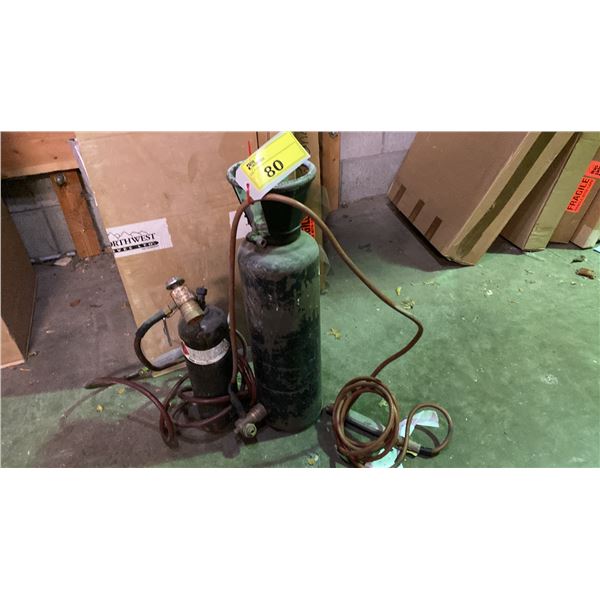 2 ACETYLENE KITS, TWO TANS, TWO HOSES, ONE TORCH HEAD.