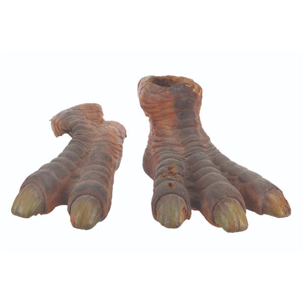 A Pair of "Land of the Lost" Dinosaur Feet.