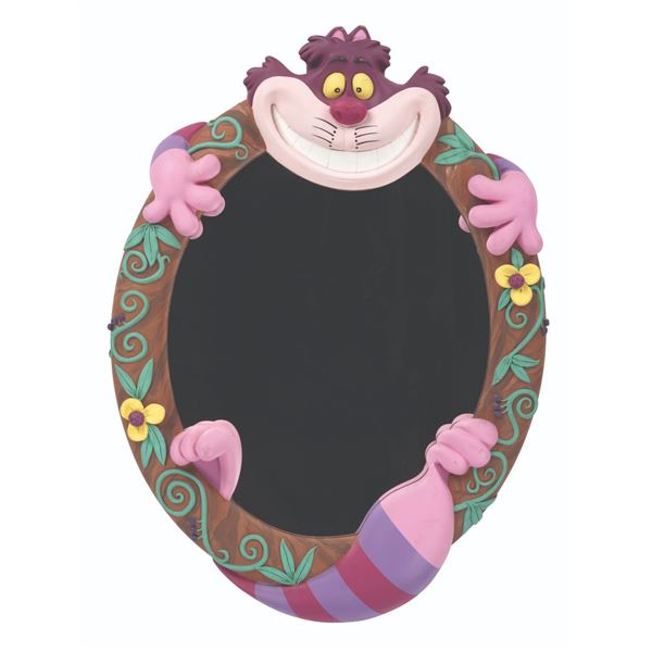 An "Alice in Wonderland" Cheshire Cat Mirror.
