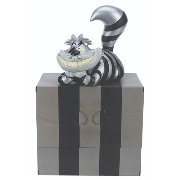 A Raiders Cheshire Cat Vinyl Figure.