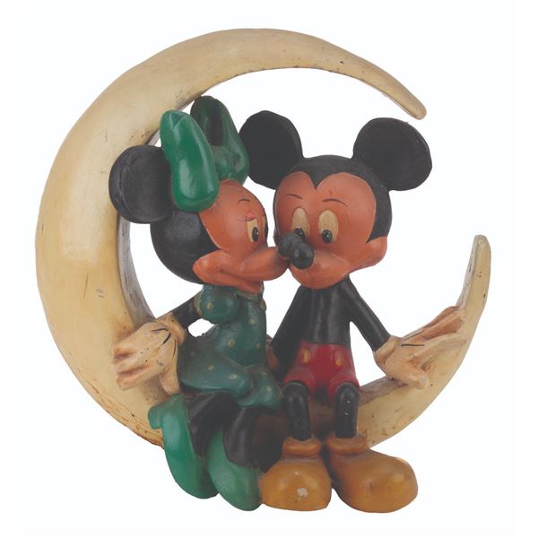 A Mickey and Minnie Mouse Moon Figure.