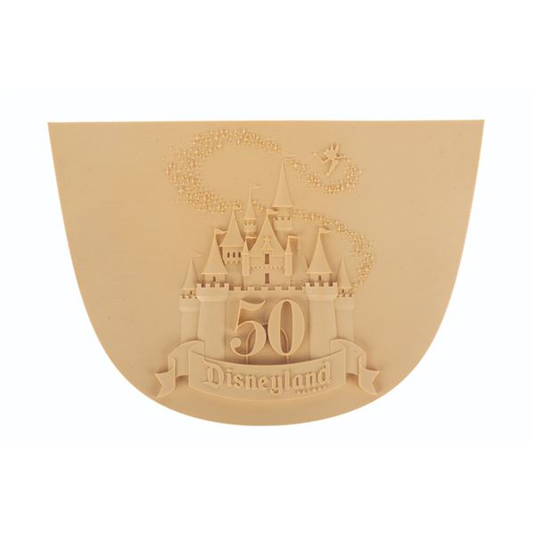 A Disneyland 50th Anniversary Plaque Production Sample.