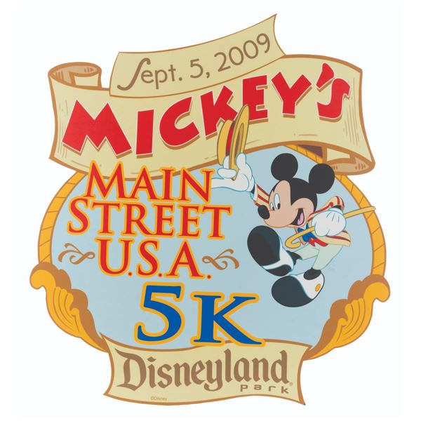 A Mickey's Main Street U.S.A. 5K Run Sign.