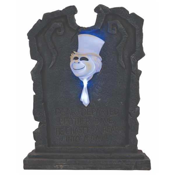 A Haunted Mansion Light-Up Tombstone Figure.