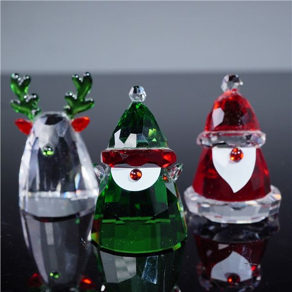 Three Swarovski Holiday Cheers Figurines, Santa Claus, Santas Elf, Reindeer