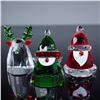 Image 1 : Three Swarovski Holiday Cheers Figurines, Santa Claus, Santas Elf, Reindeer