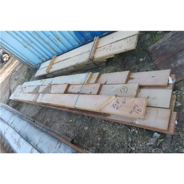 Seventeen 2" x 8" Treated Boards, 9'–16'