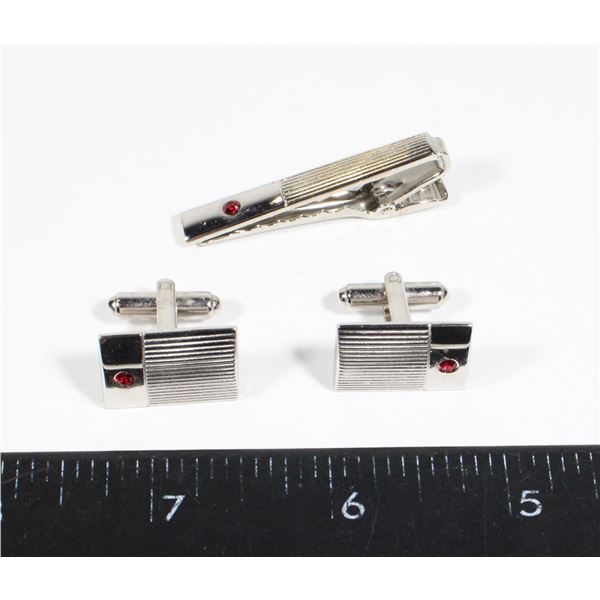 SILVERTONE CUFF LINKS AND TIE CLIP. RED RHINESTONE