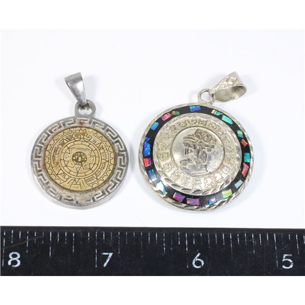 TWO MEXICAN MAYAN CALENDAR PENDANTS