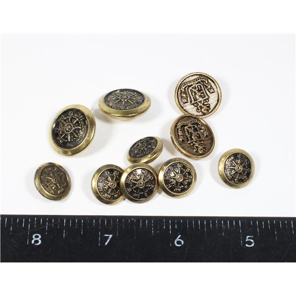 SMALL BAG OF ASSORTED METAL COMPASS/LASING LION