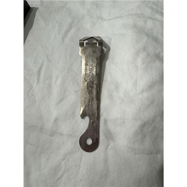 Vintage carnation milk can opener from CONTENTED cows