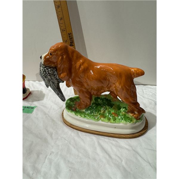 Vintage cocker spaniel with pheasant