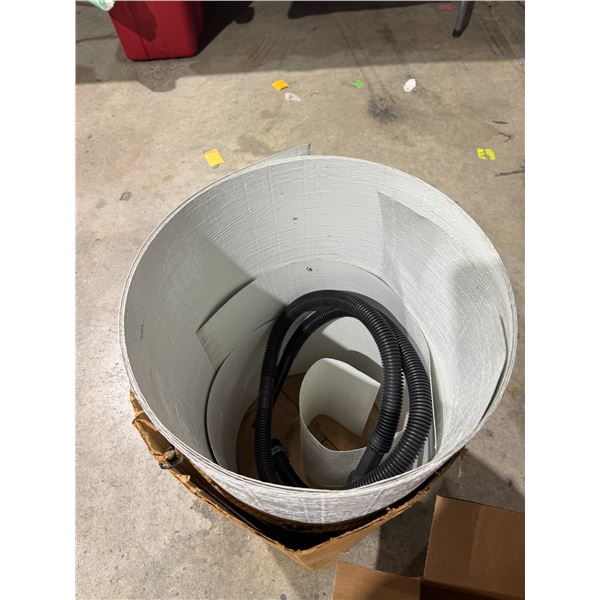 Construction item, material, and vacuum hose