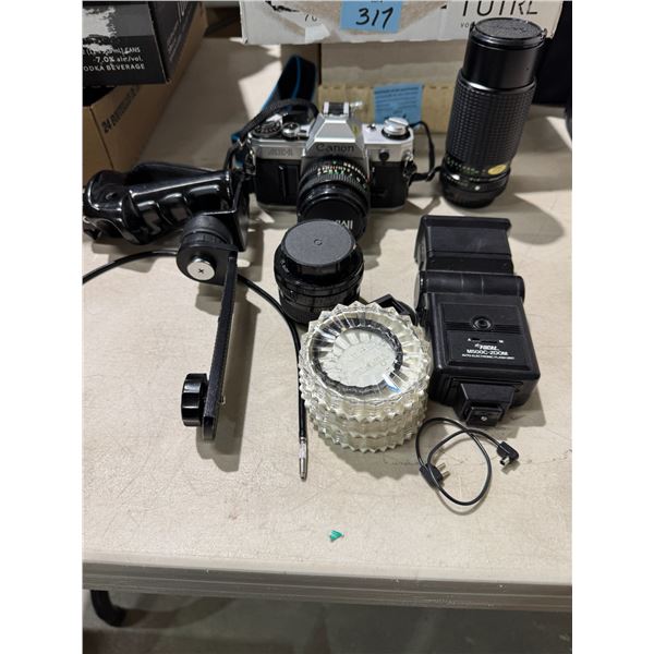 Canon AE – one camera and other camera accessories