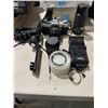 Image 1 : Canon AE – one camera and other camera accessories