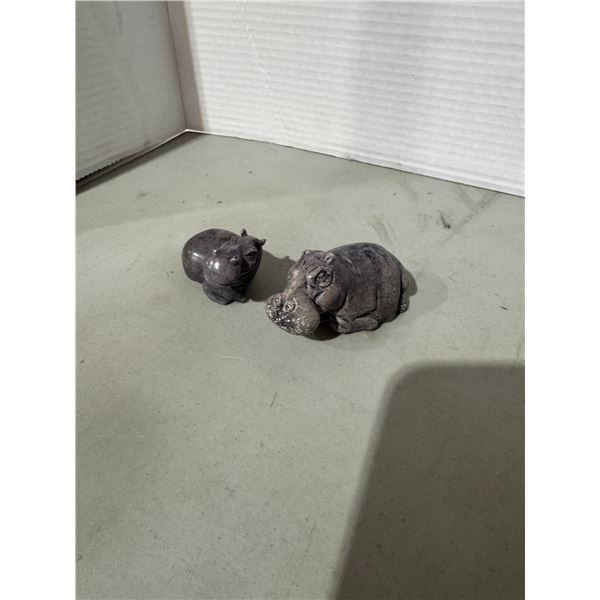 Carved hippopotamuses