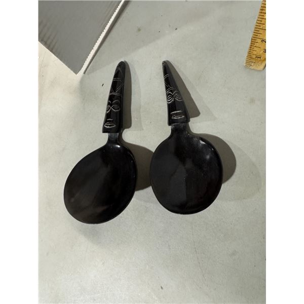 handcrafted buffalo horn spoon with a carved handle