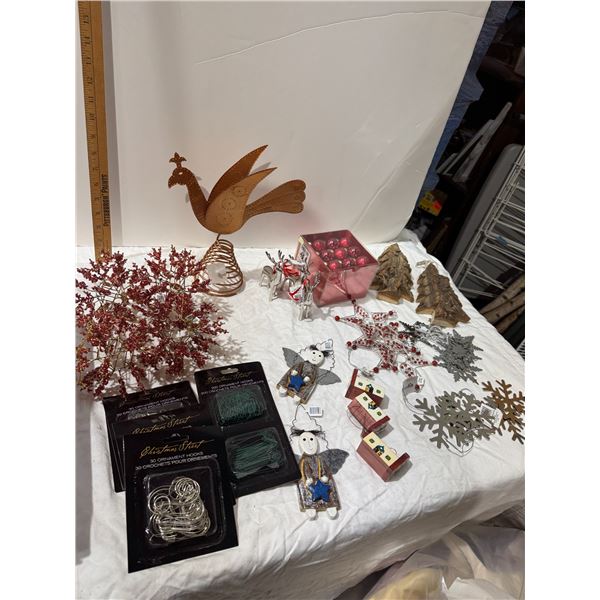 Assorted hooks and ornaments and tree topper