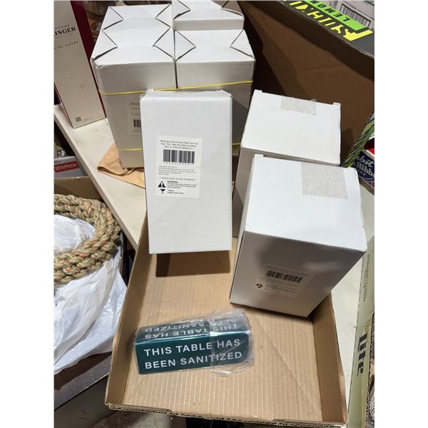 Lot of table tents this table has been sanitized