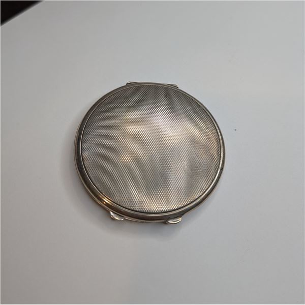 Textured mirror compact stamped