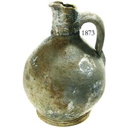 Small, bulbous, earthenware pitcher.