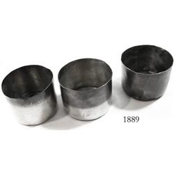 Set of 3 silver cups.