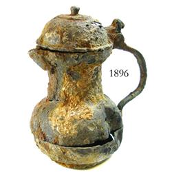 Small pewter pitcher, encrusted.