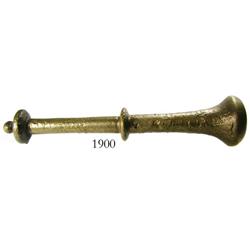 Brass pestle.