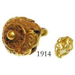 Gold filigree button and bead.
