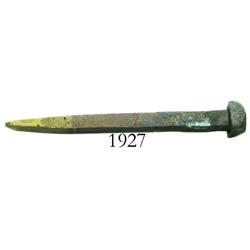 Small, brass spike.