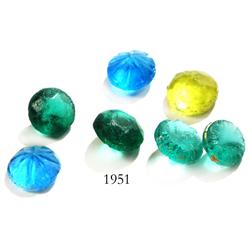 Lot of 7 small glass beads.