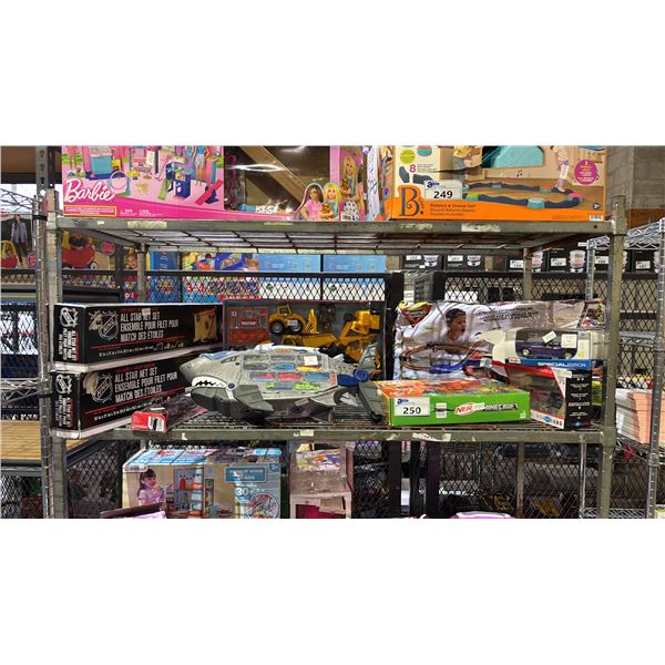 SHELF OF ASSORTED TOYS: NHL ALL STAR NET SETS, EXCAVATOR TOYS, SHARK TRANSPORTER & MORE