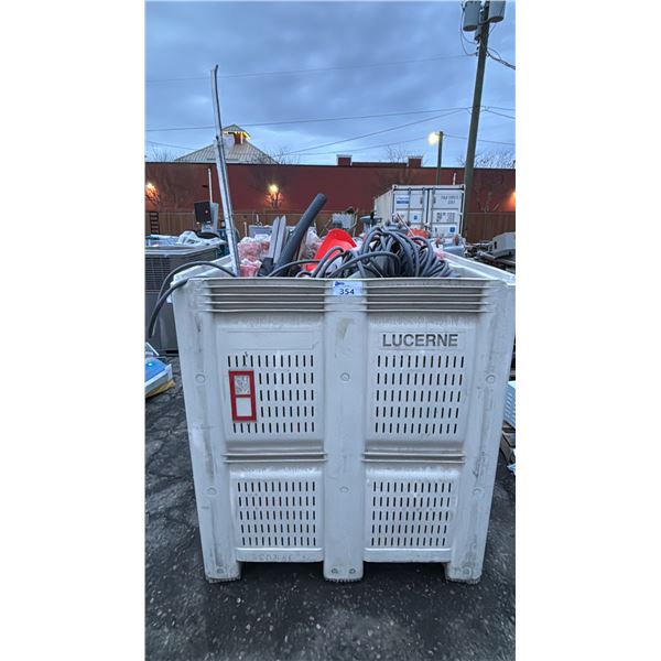 BIN OF ASSORTED ITEMS INCLUDING; FOAM CONDUIT, WOOD STAKES, TEMPORARY ORANGE FENCING & MORE