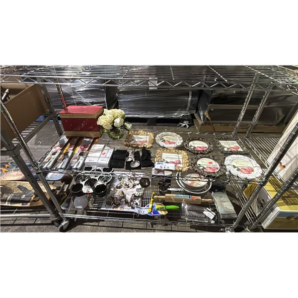 SHELF OF ASSORTED ITEMS INCLUDING, PICTURE FRAMES, BBQ LIGHTERS, VASE WITH FAUX FLOWERS & MORE