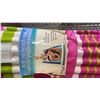 Image 2 : SHELF OF ROLL-UP BEACH MATS