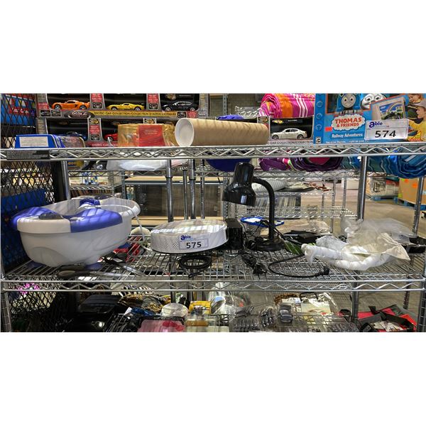 SHELF OF ASSORTED ITEMS INCLUDING; FOOT BATH, ROBOT VACUUM, DESK LAMP & MORE