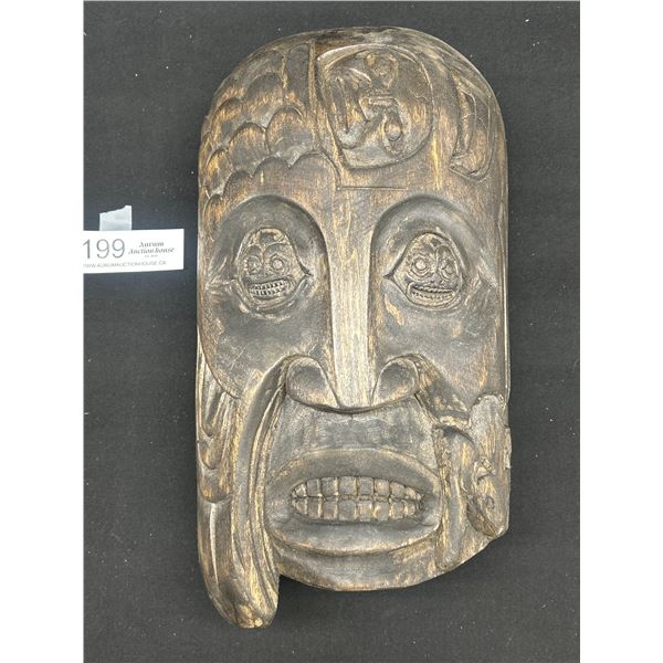 12.5" Talll Carved West Coast Native Mask Lots of Detail with Faces Carved in the Eyes Etc.