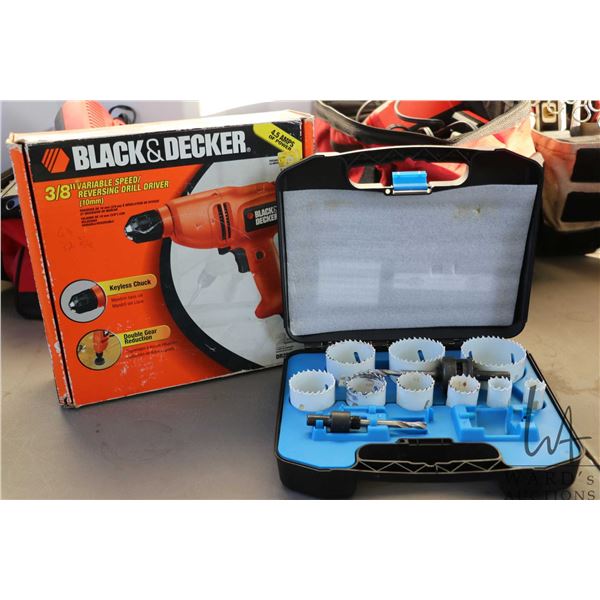 Black & Decker variable speed drill with Mastercraft hole saw set, appears complete