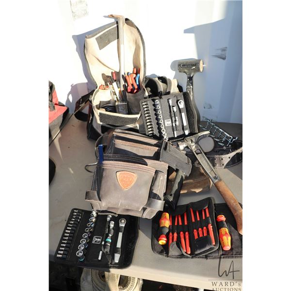 Large selection of general construction tools including pliers, screw drivers, hammers, tape measure
