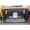 Image 2 : Workman TopBox portable work surface with a selection of assorted tools and hardware plus a white ha